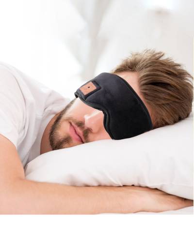 a side sleeper with bluetooth eye masks